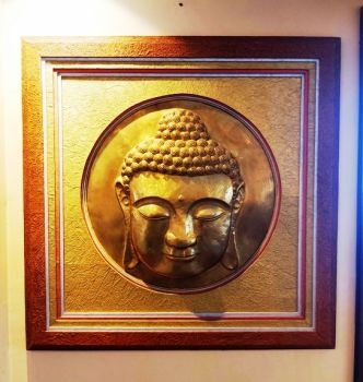 Wall hanging made from hard dye board and Nepali Lokta paper with round buddha metal framing.