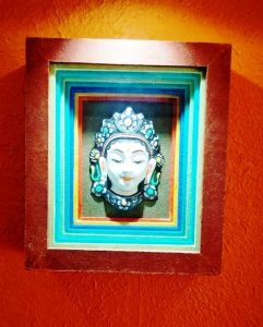 Wall hanging made from Nepali Lokta paper and hard dye board with ceramic framing.